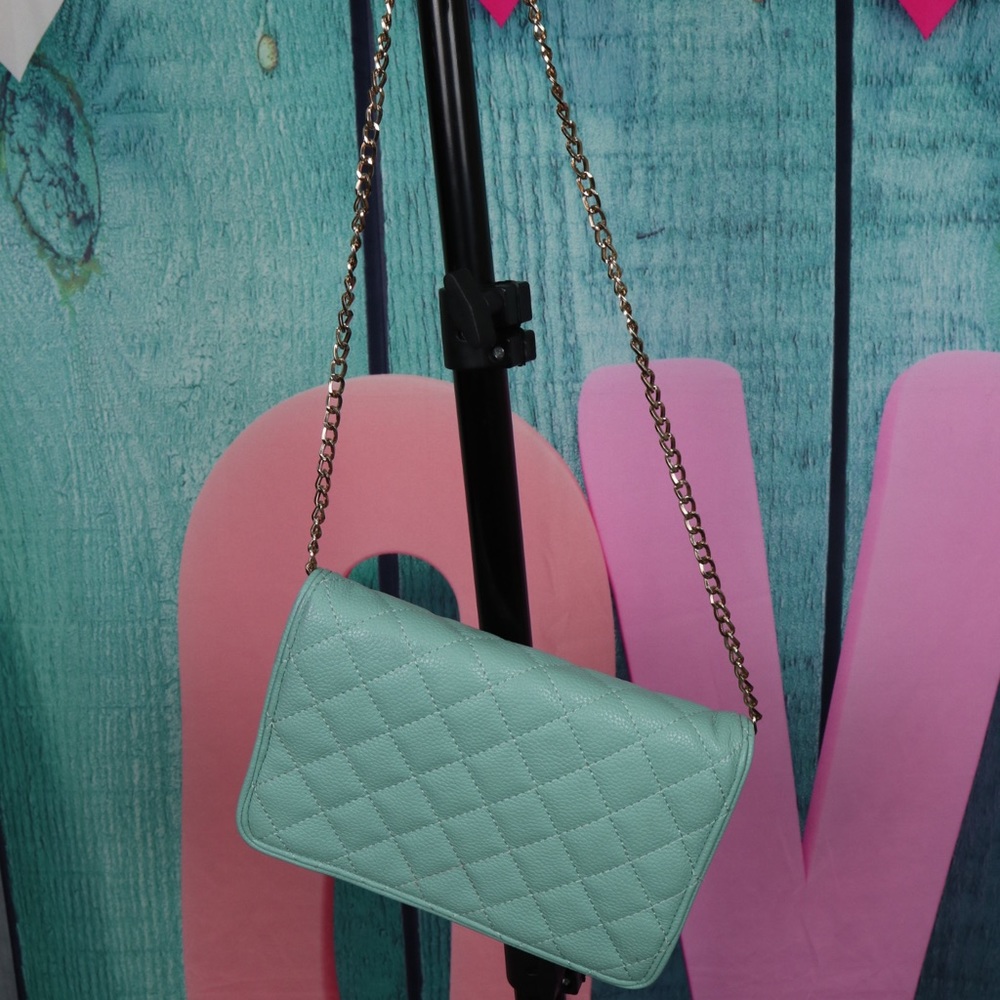 Teal crossbody bag.